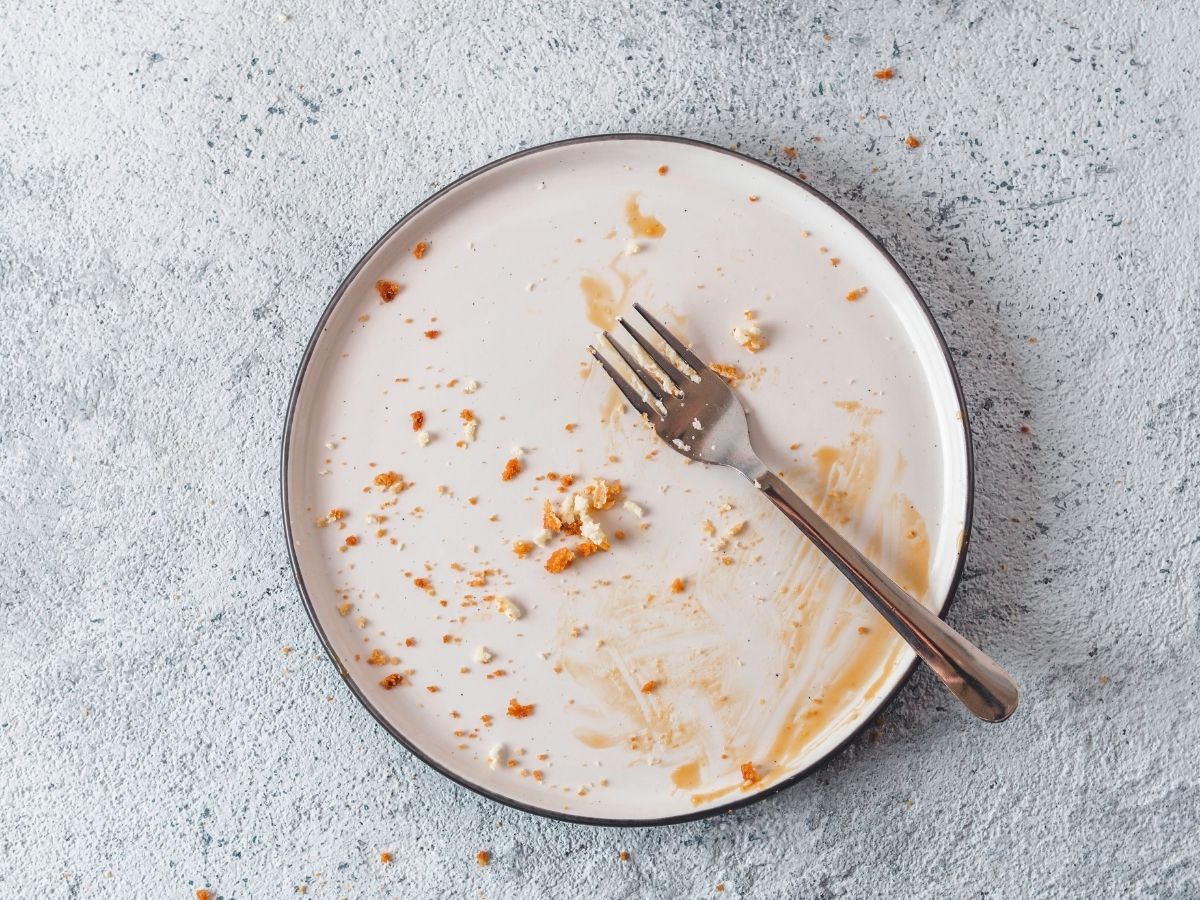 Image of a plate that has been fully eaten depicting the clean plate club